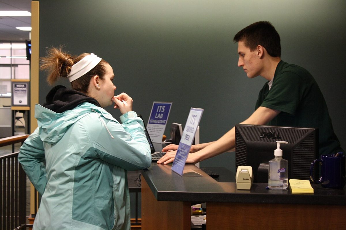 Technicians handling tickets at a 24/7 service desk
