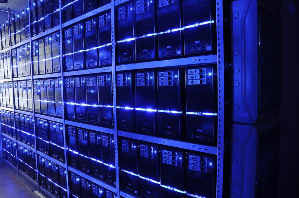 Cloud cost optimisation in practice: illuminated server racks in a data centre