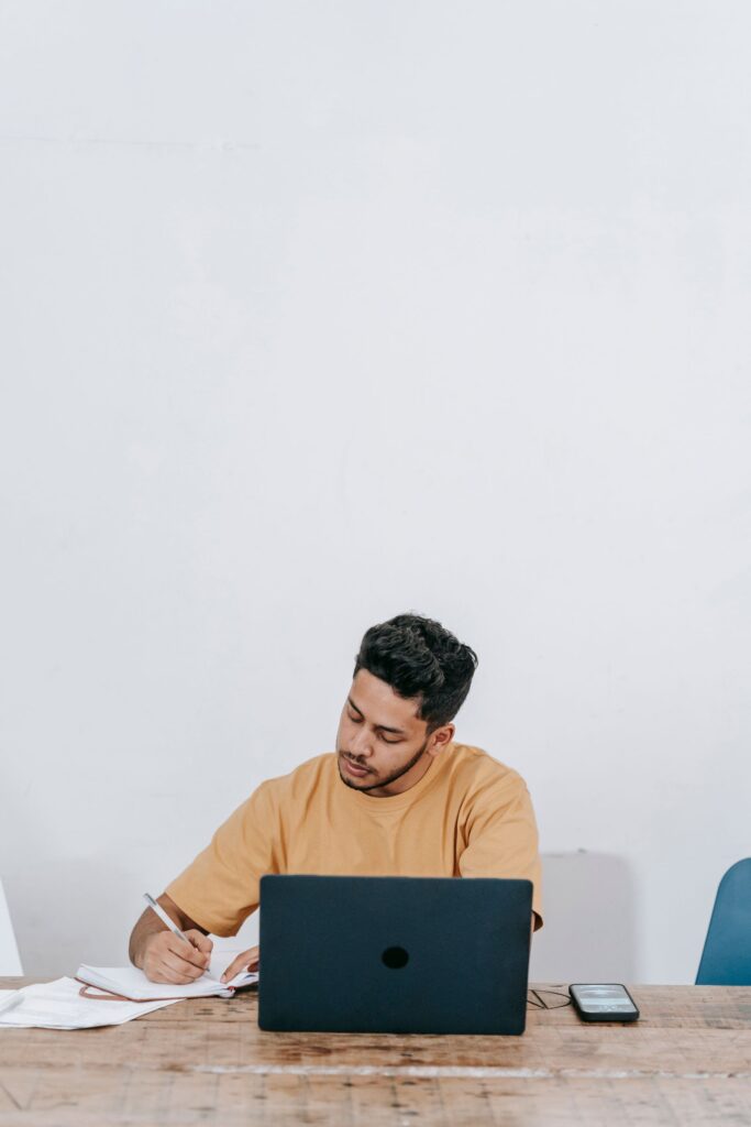 Outstaffing South Africa: remote IT engineer working from a home office on a laptop