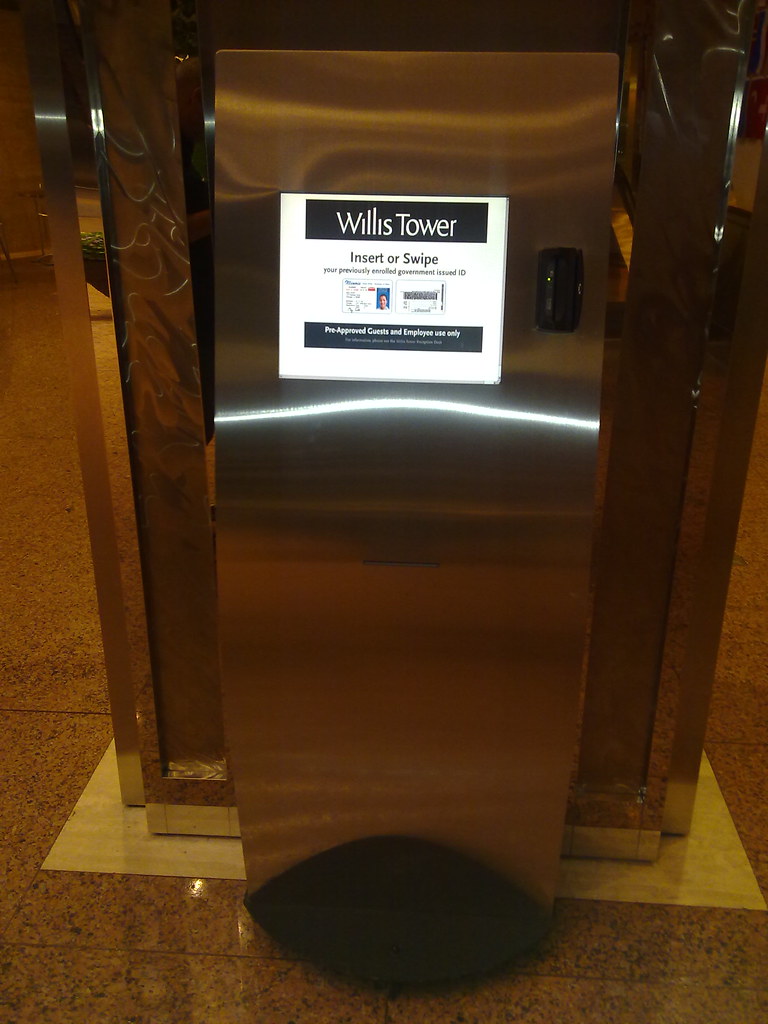 User offboarding in practice: an employee keycard login kiosk controlling access to a building and its systems