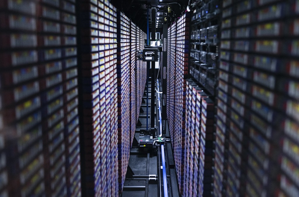 Data centre racks illustrating the storage cost behind security log retention